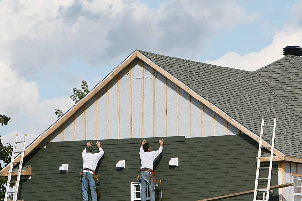 Professional Vinyl Siding technician working in Davidson, NC